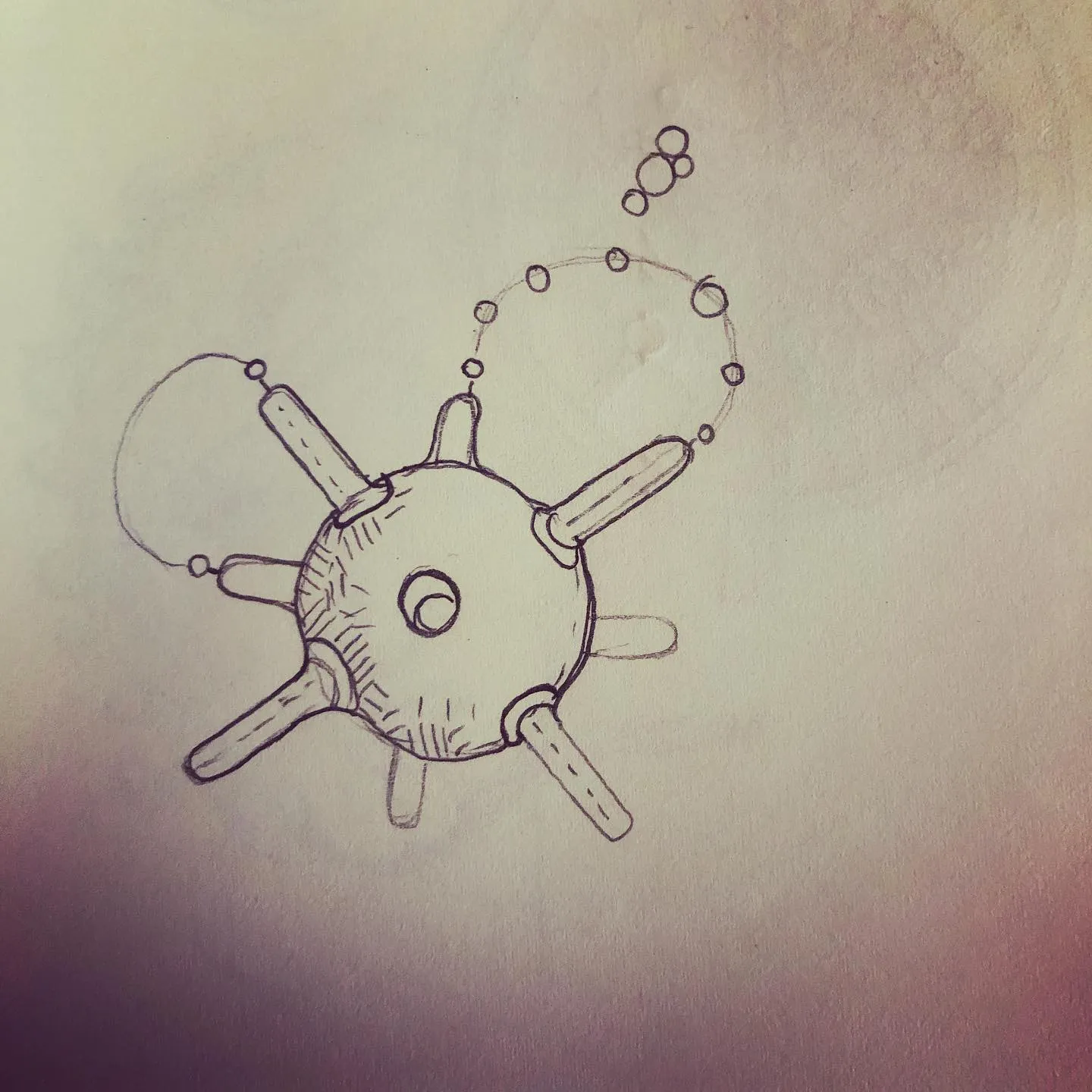 Delicate line drawing of a round spiked object, like a sea mine or a spore, trailing a chain of small bubbles.